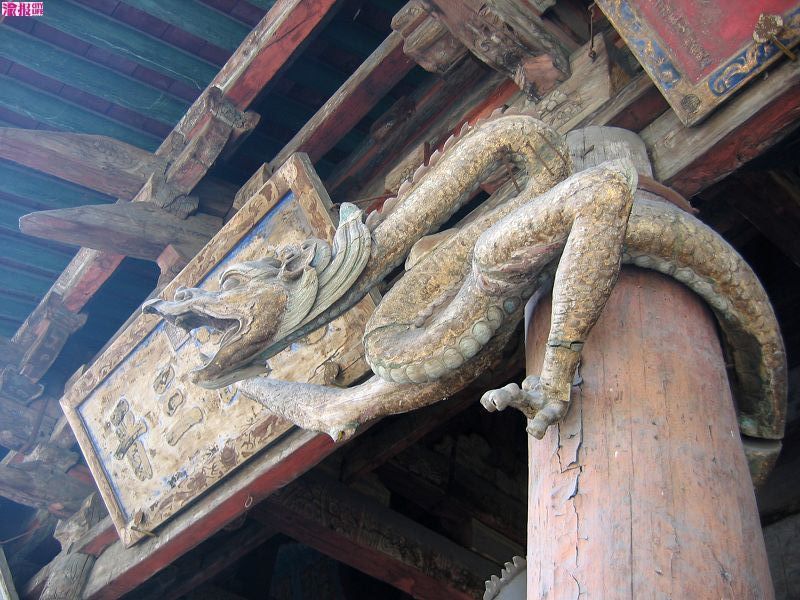 wooden dragon around the pillar of Jinci Temple
